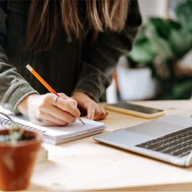 close-up-woman-hands-writing-in-notebook-2021-09-02-12-36-08-utc.jpg